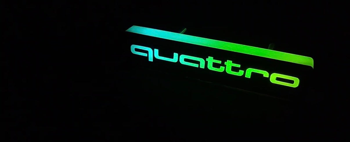 Quattro RGB badge